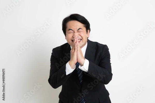 Obraz 中年の日本人サラリーマン男性