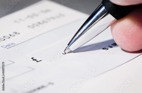 Fototapeta Writing a cheque