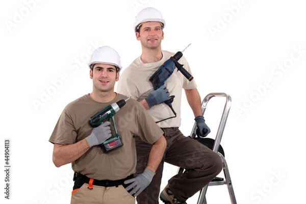 Fototapeta Two artisans with drill
