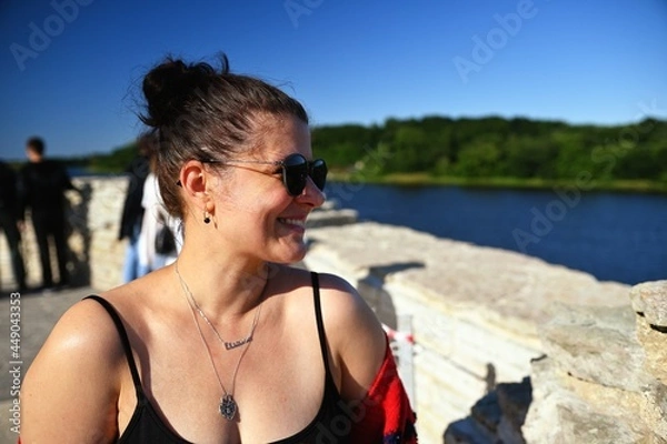 Obraz Portrait of woman against the background of old ruins