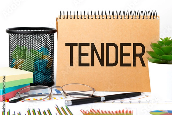 Fototapeta Word TENDER on notebook, glasses, sticker, chart, diagram.