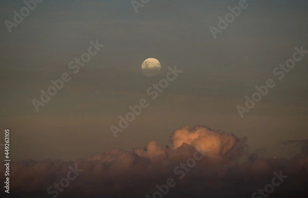 Obraz moon over the clouds