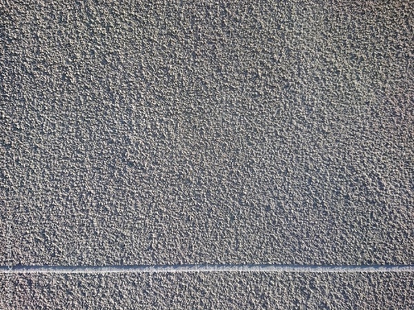 Obraz Gray background texture, splashing plaster wall facade and white line