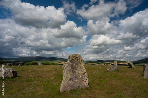 Fototapeta Tomnaverie Standing Stones near Tarland, Aberdeenshire, Scotland. Sunny day with blue sky and clouds. These are c4,000 year old standing stones forming a circle.