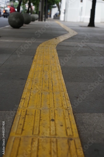 Obraz guiding block on the sidewalk