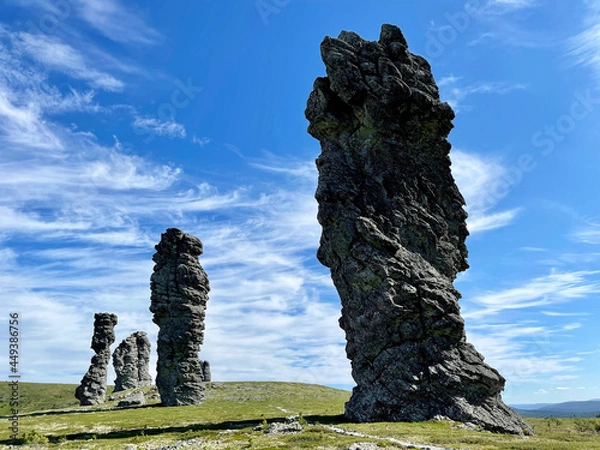 Fototapeta Stone pillars of weathering on the Manpupuner mountain plateau in the Komi Republic in Russia in summer in clear weather