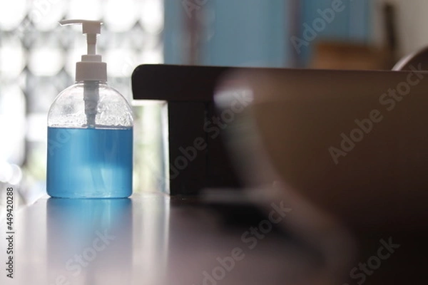 Obraz alcohol gel press pump bokeh background