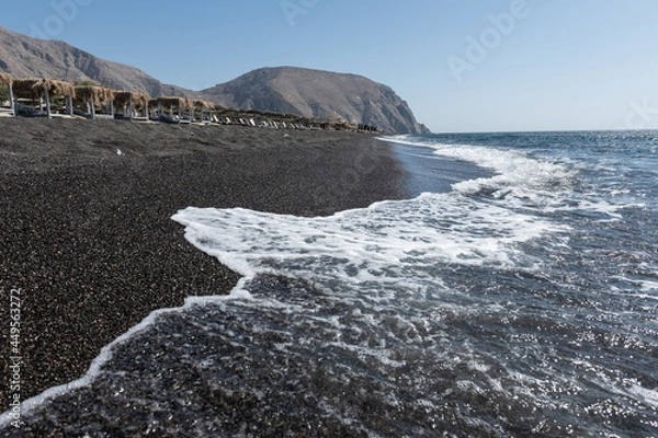Fototapeta empty Black Sand beach in Santorini Greece early morning 
