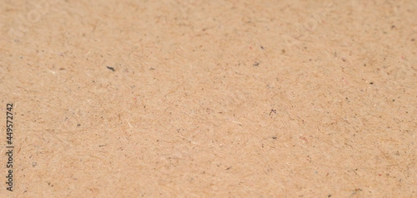 Fototapeta light-colored, smooth recycled paper texture with copy space, close-up