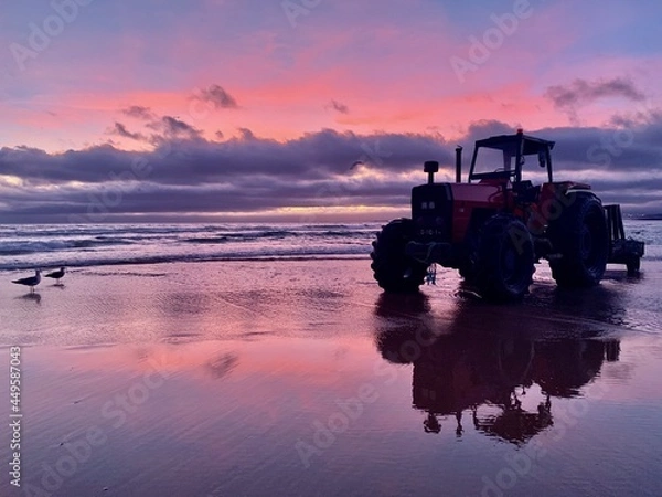 Fototapeta tractor on the beach