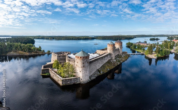 Fototapeta Aerial panorama of Olavinlinna castle and the surrounding lakes in Savonlinna, Finland.