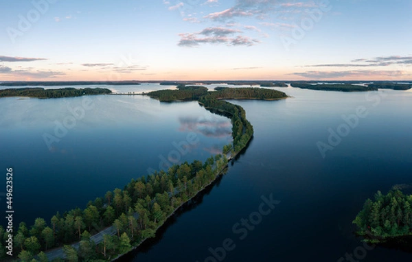 Fototapeta Aerial drone view of Punkaharju nature reserve and its famous ridge road in Savonlinna, Finland.