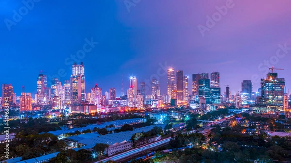 Fototapeta The glowing skyline of downtown Mumbai- Lower Parel and Worli at night, consisting of many residential and commercial skyscrapers and highrises. 