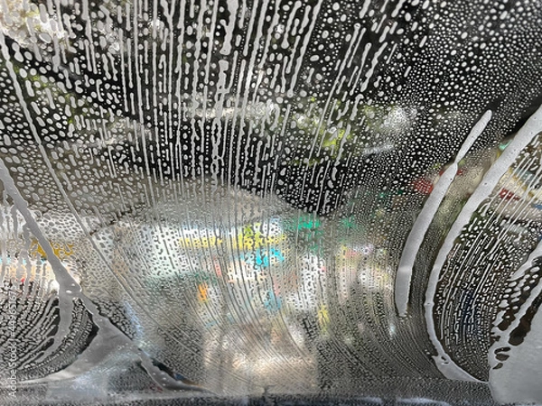 Obraz Bubble water on the windshield for cleaning.