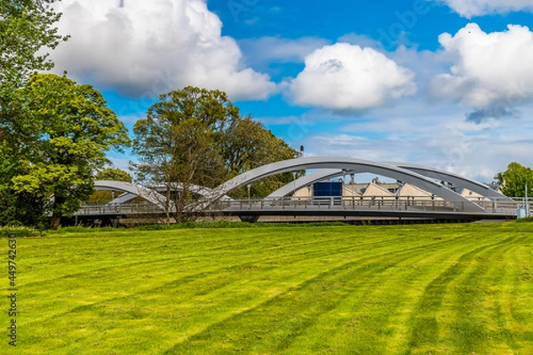 Obraz A view of a bridge over the River Lossie beside Elgin Cathedral, Scotland on a summers day