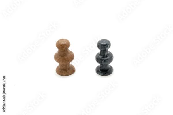Obraz Two chess pieces white and black upright