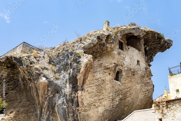 Fototapeta Domus de Janas, the house in the rock or house of fairies, an extraordinary example of pre-Nuragic architecture in the Anglona historical region in north-west Sardinia. Sedini, Sassari, Italy, Europe