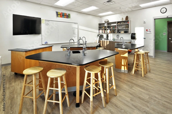 Fototapeta Modern school science lab classroom with barstool seating
