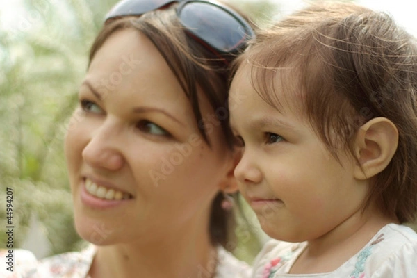 Obraz Mum and her kid went for a walk