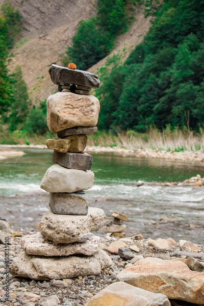 Obraz Different form rock balanced on the beach 