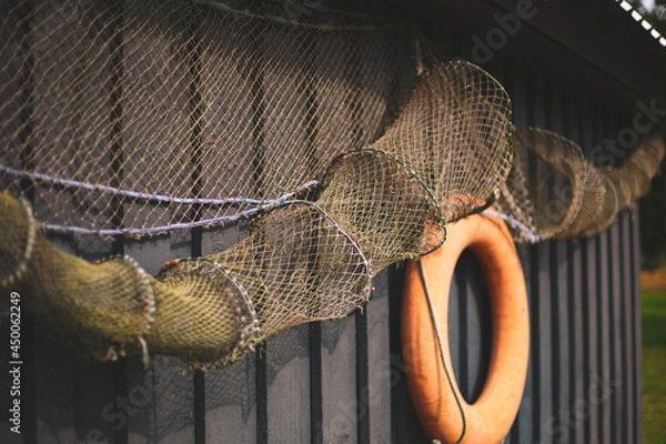 Fototapeta fishnets on a wall