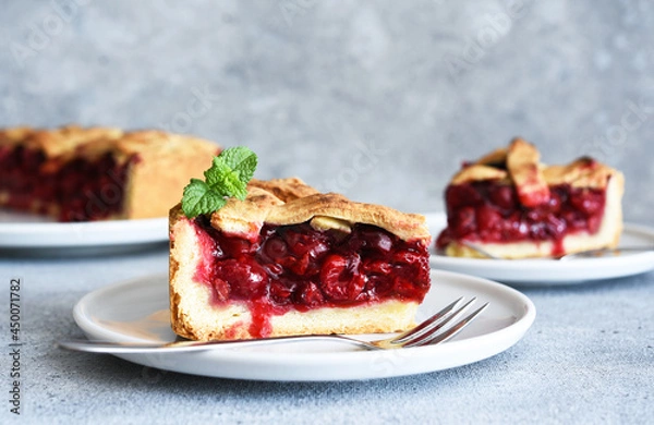 Fototapeta slice of cherry pie on the kitchen table. Fruit pie. Tart.