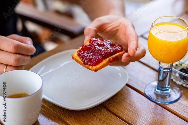 Obraz Orange juice for breakfast. Cupcake with jam. Baking with jam. Toast with jam. Orange. Fresh for breakfast. Delicious bright food. Nice breakfast.