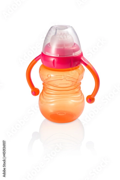 Fototapeta Fun orange baby bottle with handles and pink ring isolated 
