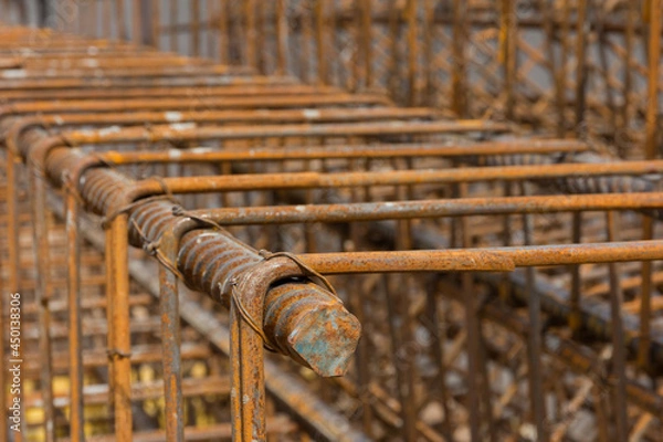 Fototapeta Rebar texture. Reinforcement steel rod. Rusty rebar for concrete pouring. Steel reinforcement bars. Construction rebar steel work reinforcement. Closeup of Steel rebars.