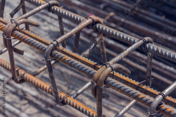 Fototapeta Rebar texture. Reinforcement steel rod. Rusty rebar for concrete pouring. Steel reinforcement bars. Construction rebar steel work reinforcement. Closeup of Steel rebars.