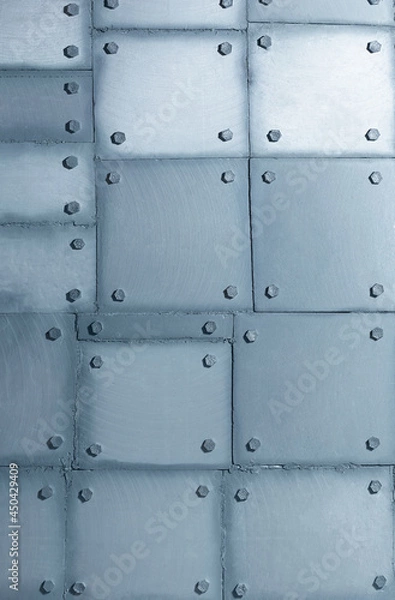 Obraz Background of silvery wall made of polyethylene foam sheets imitating metal with rivets.