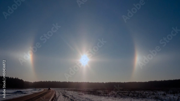 Fototapeta A halo is an optical phenomenon, a luminous ring around the sun