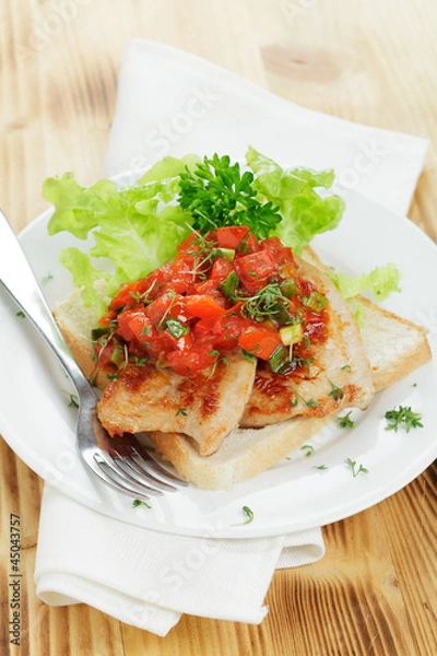 Obraz Putensteak mit Tomatensugo