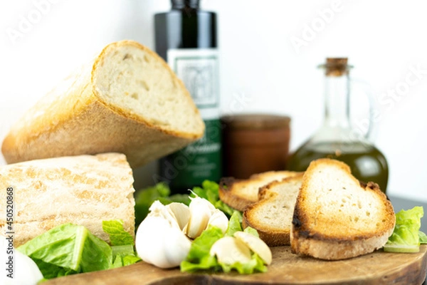 Obraz Close up of food display for fettunta with garlic and tuscan bread