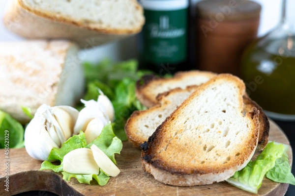 Obraz Bread food display for fettunta with oil garlic an tuscan bread elegant display