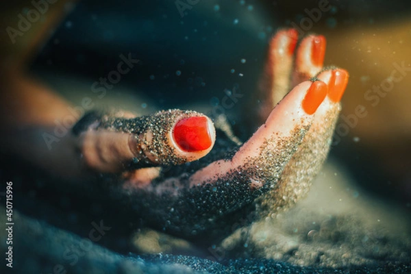 Obraz Hand With Red Nails In Sand