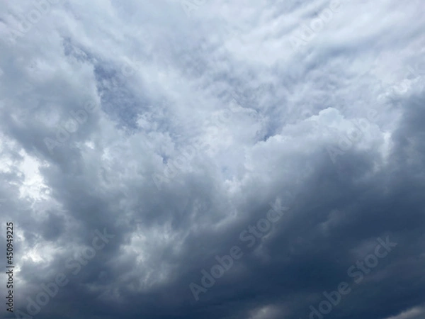 Fototapeta Looking up at dark rain clouds. Dramatic sky during storm