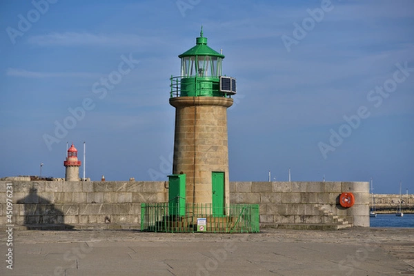 Fototapeta Beautiful evening view of red and green East and West Pier lighthouses in Dun Laoghaire harbor, Dublin. Ireland, Soft and selective focus