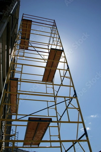 Obraz Scaffolding on blue sky background