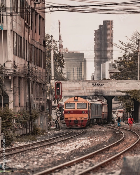 Obraz Bangkok Railway Station or Hua Lamphong Station is the main railway station in Bangkok and Railway station to across the country. background is building downtown.