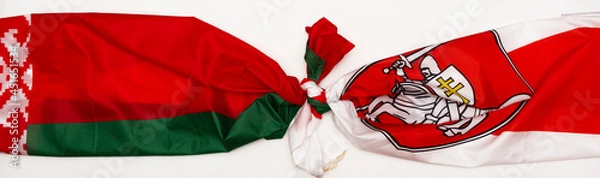 Fototapeta Two flags of Belarus Red-green flag of Belarus with a White-red-white flag tied together in a knot