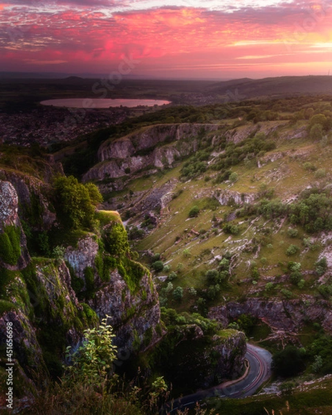 Obraz Colourful sky over cheddar gorge at sunset.