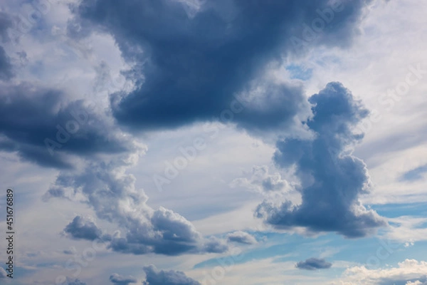 Fototapeta Clouds frame on blue sky. Beautiful air background with free space.