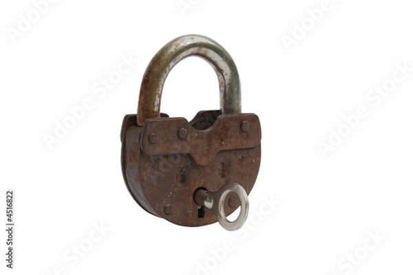 Fototapeta Old rusty padlock with key