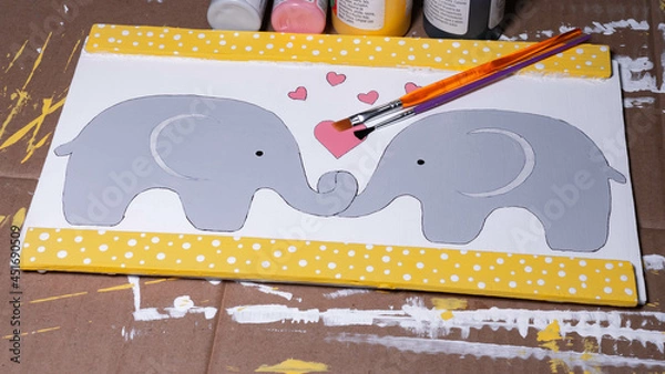 Obraz Painted elephant with hearts craft