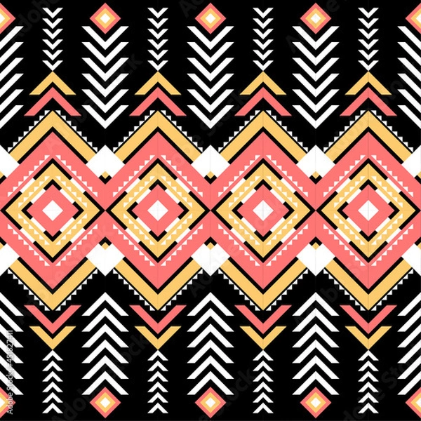 Obraz Ethnic pattern on. Black background, vector seamless pattern with yellow, pink, and white. Traditional geometric pattern design. Textile abstract pattern