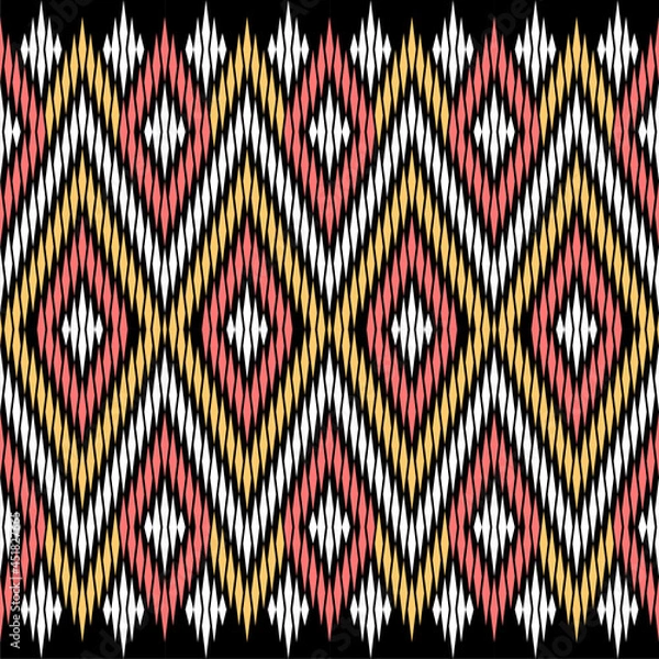 Fototapeta Traditional textile pattern, ethnic pattern on black background, ikat pattern 