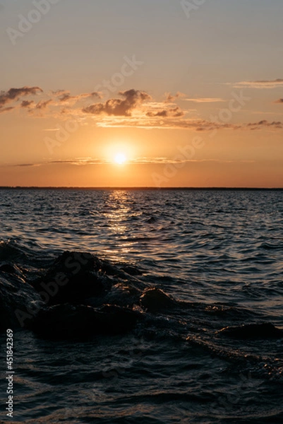 Fototapeta Photo of a Summer Sunset on the Lake. Travel location of popular tourist outdoor. View of beautiful Sea Landscape. Relax vacation near water