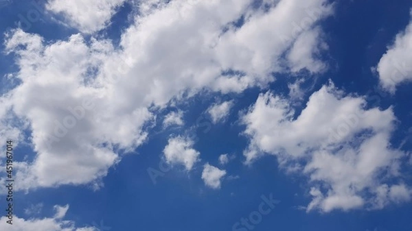 Obraz White cloudy and bright blue sky in sunny day as background.
