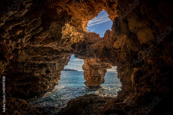 Fototapeta Natural cave on the coast in Spain, Benitatxell, Alicante, Cova dels Arcs